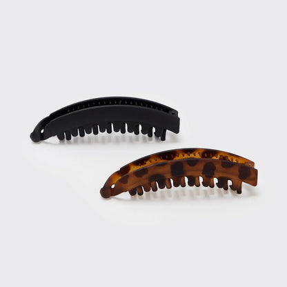 Clip de plátano 2 pzas - Negro y Carey, Hecho de plástico negro con diseño de tornado, ideal para almacenamiento de alimentos